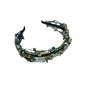 Forest style twisted headband with green braided fabric and colorful crystal beads