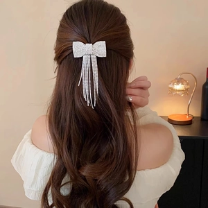 Elegant sparkling rhinestone bow hair clip with long tassels for formal hairstyles