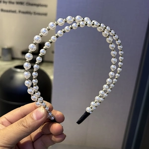 Elegant double-layer headband with white faux pearls and golden beads for women