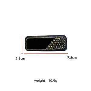 Detail view of velvet crystal hair clip showing dimensions 7.8cm by 2.8cm and weight 10.9g