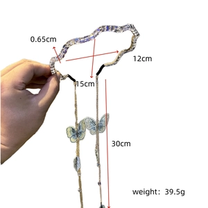 Detail view of crystal headband with blue butterfly tassels and product dimensions