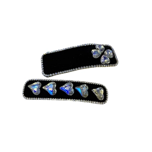 Elegant black velvet hair clips with rhinestone borders and heart-shaped crystals