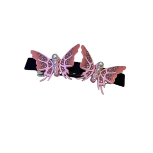 Pink acetate double butterfly hair clip with elegant pearl and rhinestone embellishments