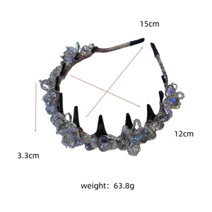 Top view of crystal beaded headband with black spike details and size specifications