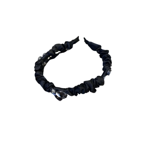 Elegant black satin headband with pleated design and sparkling crystal embellishments