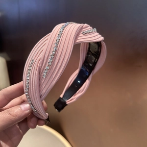 Pink wide headband with rhinestone crossover knot and textured ribbed fabric