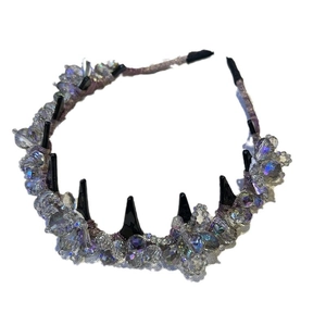 Iridescent crystal and black spike headband with textured wave pattern and high top design