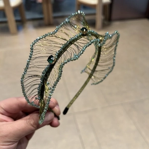 Luxurious handmade crystal beaded headband with green gemstones and gold woven wire design