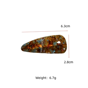 Detailed size specifications of amber tortoise shell hair clip with colorful rhinestones