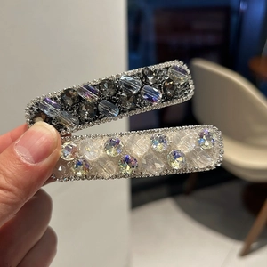 Sparkling rhinestone hair clips for women with crystal and pearl accents in a set of two