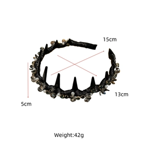 Detail view of luxury crystal headband with black spikes and dimensions: 15cm x 13cm