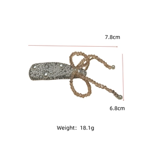 Detailed view showing dimensions 7.8x6.8cm of floral pearl hair clip with rhinestones