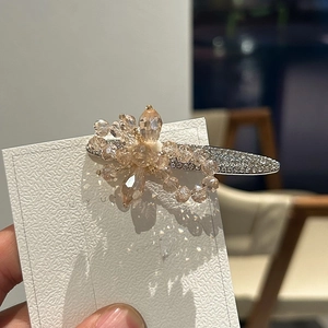Pince à cheveux fleur en cristal élégante avec strass scintillants en or champagne