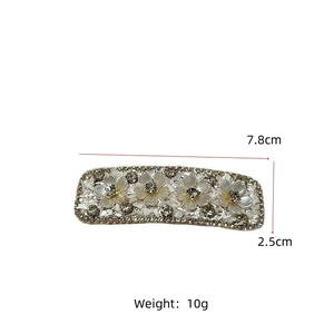 Floral hair clip with pearls and rhinestones detailing, 7.8cm long metal hair accessory
