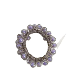 Minimalist jelly purple bead hair tie with metallic elastic band on white background