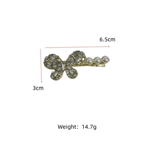 Detail showing dimensions of the elegant zircon bow hair clip with white pearls