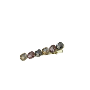 Elegant gold metal hair clip featuring six colorful geometric crystals in purple and blue
