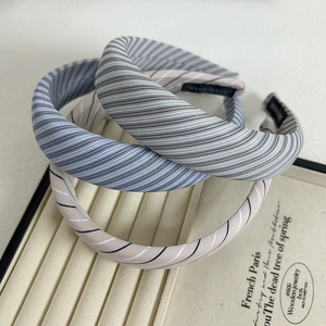 Three-piece set of striped cotton padded headbands in assorted pastel colors for women