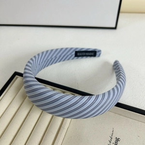 Padded striped headband in blue and grey cotton fabric with a handmade inner label
