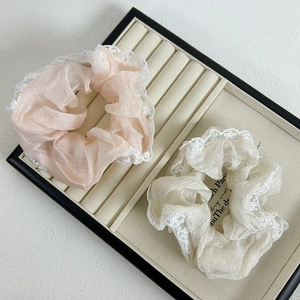 Set of two French-style organza scrunchies with white lace trim in pink and beige