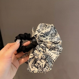 Elegant oversized scrunchie with vintage black and white artistic sun and moon print