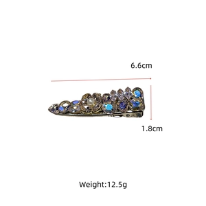 Size chart showing a 6.6cm rhinestone hair clip with dimensions and 12.5g weight detail