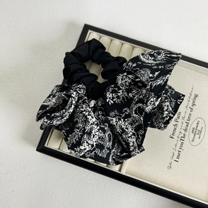 Elegant black and white vintage floral print oversized bow scrunchie for hair styling