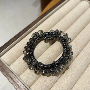 Elegant gradient crystal beaded hair tie with charcoal gray faceted stones for women