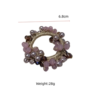 Dettaglio dell'elastico per capelli con perline di cristallo diametro 6,8cm e 28g