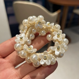 Elegant pearl scrunchie with white camellia flowers and sparkling rhinestones for women