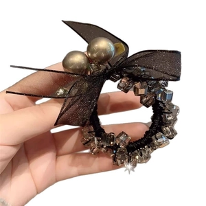 Eleganter schwarzer Haargummi mit Schleife, Kristallperlen und Champagner-Perlen