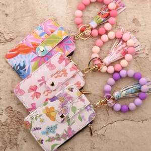 Floral print silicone bead bracelet keychain wallet with tassel and golden metal clasp
