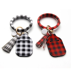 Buffalo plaid keychain bangle set with lipstick holder and tassel in black and red colors