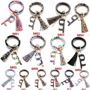 Leather circle keychain bracelet with tassel and no-touch door opener in 14 patterns