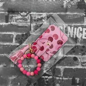 Pink cherry print card holder wallet with silicone bead bracelet and tassel keychain