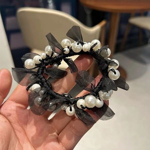 Elegant black mesh scrunchie with faux pearls and camellia style bow for women