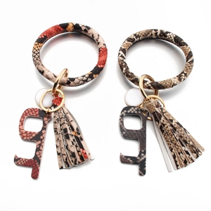Faux leather snake skin wristlet keychain with tassel and no-touch door opener tool