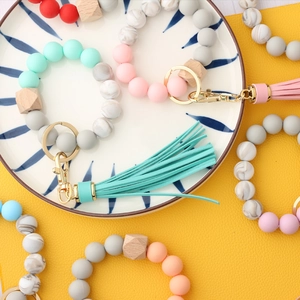 Macaron color silicone bead bracelet keychain with wooden beads and tassels for women