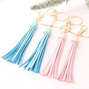 Pastel blue and pink PU leather tassel keychains with gold plating and lobster clasps