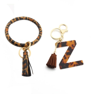 Detailed leopard print PU leather wristlet keychain with Z letter and brown tassel