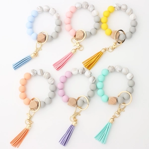 Silicone bead key ring bracelet set with leather tassels and wood beads in six colors