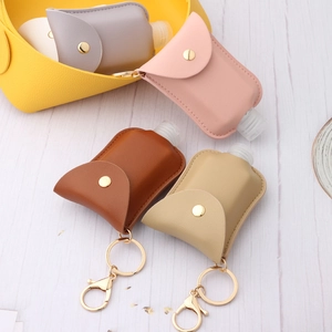 Portable hand sanitizer leather holder keychain in various colors with metal lobster clasp