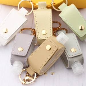 Portable PU Leather Hand Sanitizer Bottle Case Keychain Set With Metal Hook Small Clear Refillable Bottle Bag Charm For Travel Daily Use