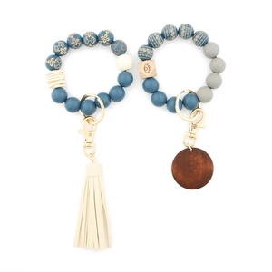 Leopard print wood bead keychain bracelet with PU leather tassel and evil eye charm