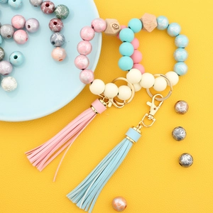 Boho printed wood bead bracelet keychain with PU leather tassel and eye motif charm
