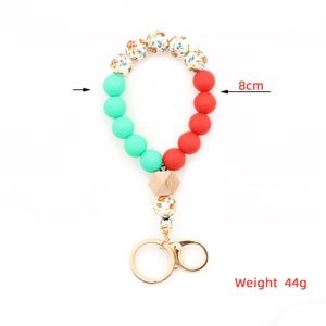 Bracelet porte-clés de Noël en perles de silicone avec motifs floraux et fermoir doré