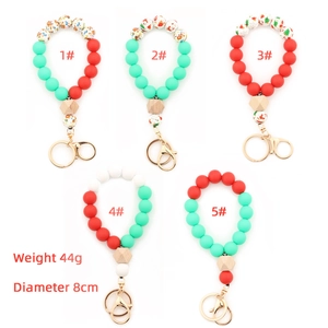 Porte-clés de Noël en perles de silicone rouge, vert et blanc avec perle en bois