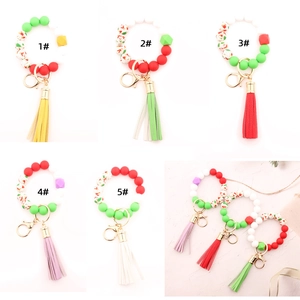Silicone bead keychain bracelet with wooden beads and leather tassel in five color options