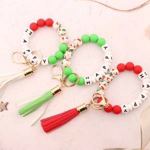 Christmas silicone bead bracelet keychain with wooden beads, HAPPY letters, and tassel charm