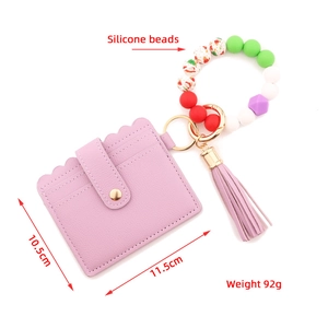 Silicone bead keychain bracelet with purple leather card holder and tassel charm